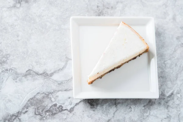 stock image A slice of classic cheesecake 