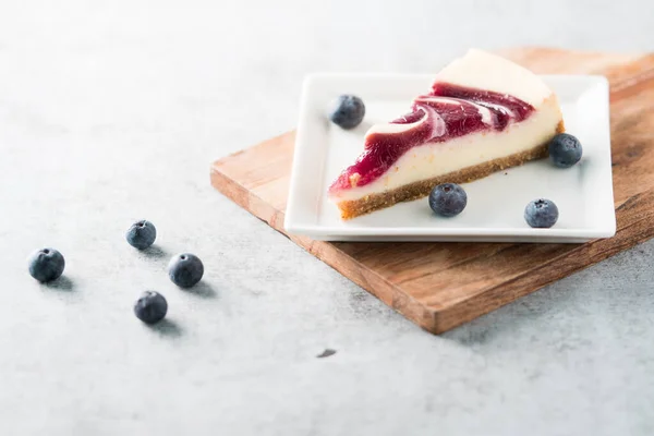 Slice Blueberry Swirl Cheesecake — Stock Photo, Image