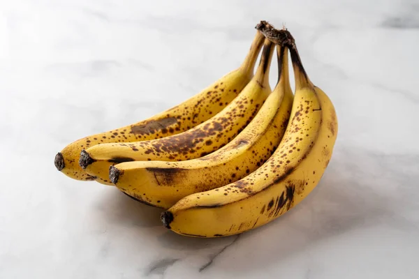 Spotted Brown Yellow Banana Bunch Marble Table Top — Stock Photo, Image