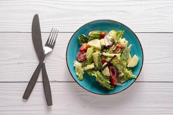 stock image Fresh garden salad on a farmhouse table