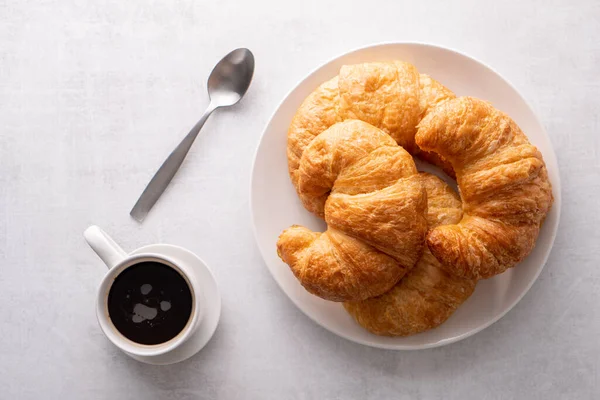 Warm Crispy Flaky Croissant Roll White Plate Distressed Table — Stock Photo, Image