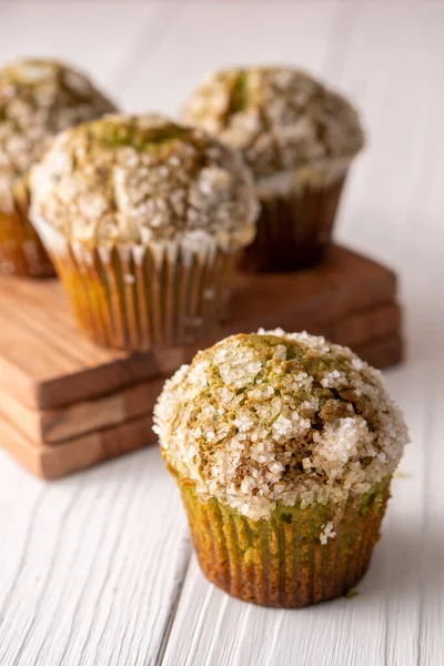Homemade pistachio muffins with sugar crystals
