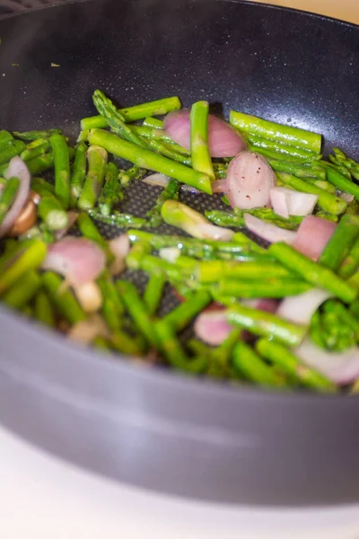 Asparagus Onion Stir Fry Pan Royalty Free Stock Images