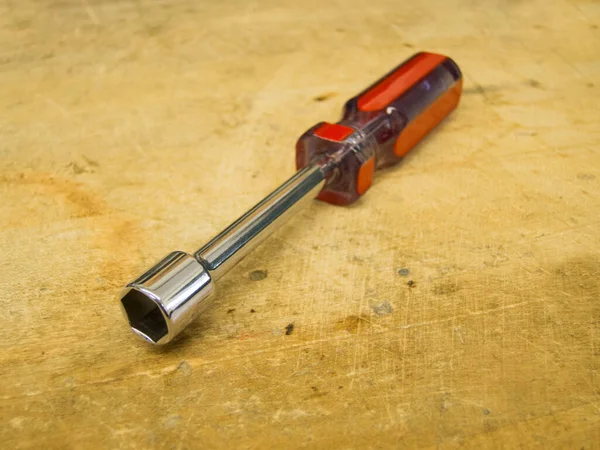 nut driver tool on work bench
