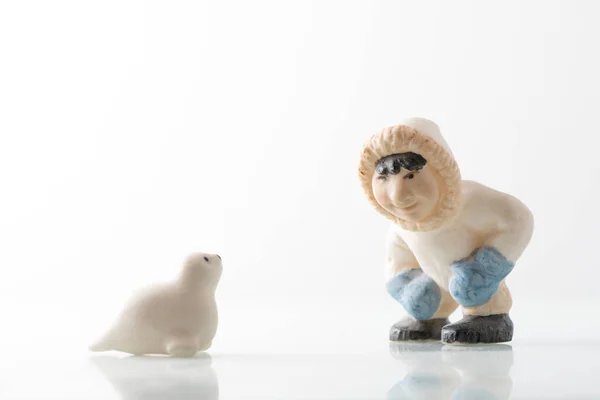 stock image Figurines, eskimo, seal, white, ice, kneeling,