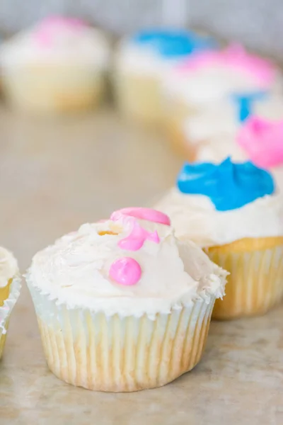Close Composed Cupcakes White Frosting Blue Pink Topping Row — Stock Photo, Image