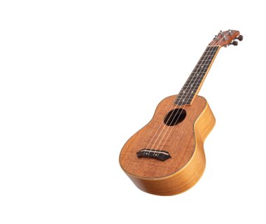 Beyaz arka planda Ukulele Hawaii gitarı, Okoume ahşabından büyücü, Seçici odak