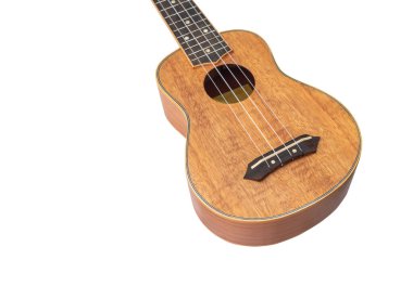 Beyaz arka planda Ukulele Hawaii gitarı, Okoume ahşabından büyücü, Seçici odak
