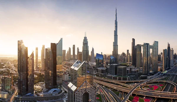 stock image Dramatic sunrise over Dubai skyline panorama with Burj Khalifa and luxury skyscrapers, United Arab Emirates