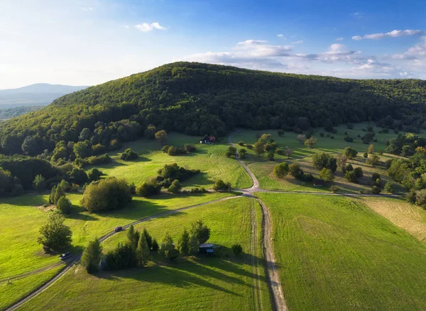 Green meadow with forest from drone with nice hill, Slovakia - Pohronsky Inovec