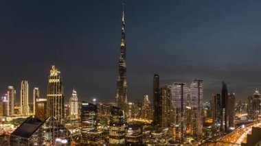 Dubai 'de gece gündüz Burç Halife siluetinin zaman aşımı - hava manzarası, Birleşik Arap Emirlikleri