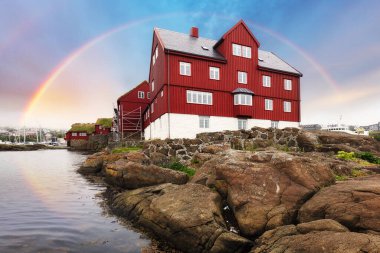 Rainbow over Parliament Tinganes in Torshavn on Faroe islands.
