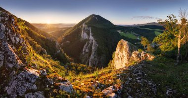 Mountain sunset landscape at sunset with sun and rock valley, Slovakia, Maninska Tiesnava clipart