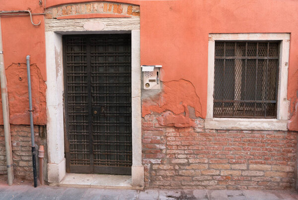 Colorful orange historic building in Venice, Italy