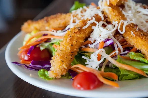 stock image Fresh salad with crispy fried crab stick