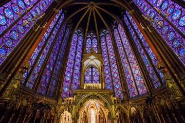 Paris, France- JANUARY 3, 2013: Altar in the upper chapel in Sainte Chapelle. Sainte Chapelle is one of the most beautiful and tourist visited landmark in Paris. clipart