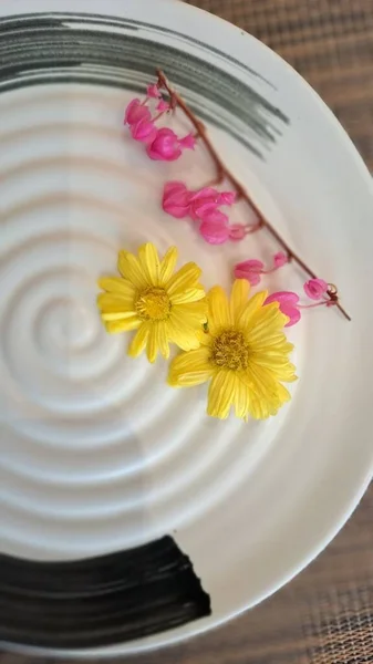 beautiful flowers in bowl with flower