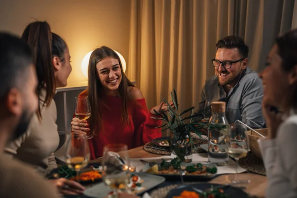 friends enjoying time gathering for dinner home party