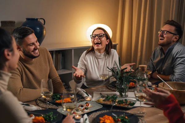 friends enjoying time gathering for dinner home party