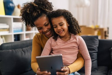 Mother and daughter talk on video call together