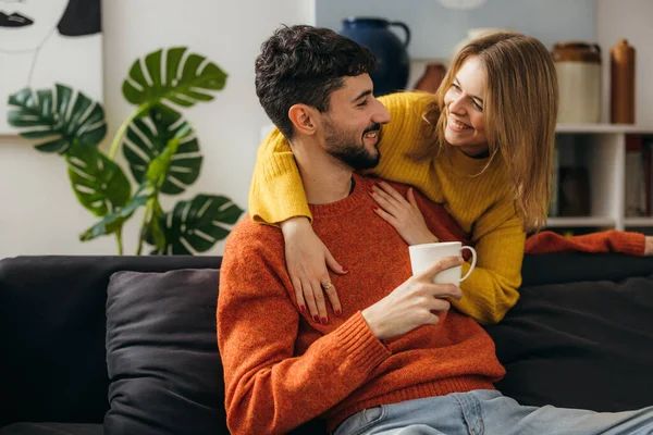 Affectionate couple having alone time at home