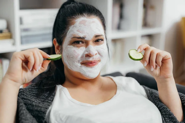 Woman is doing a skin care routine