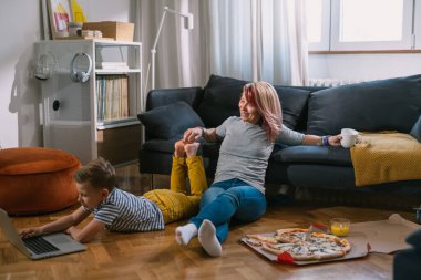 Mother and son spend weekend together at home