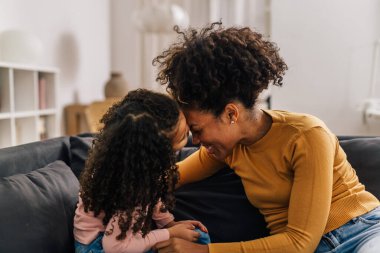 Precious moment between mother and her daughter