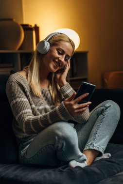 Beautiful woman enjoys the music