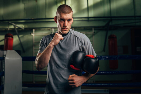 Portrait of a Caucasian male boxer looking at the camera