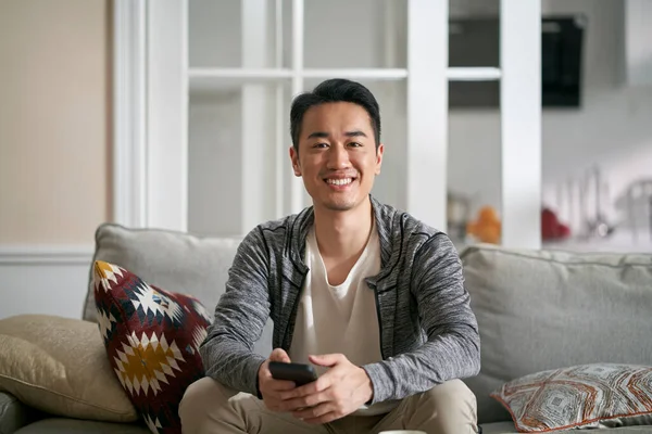 Home Portrait Young Happy Asian Man Sitting Family Couch Looking — Stock Photo, Image