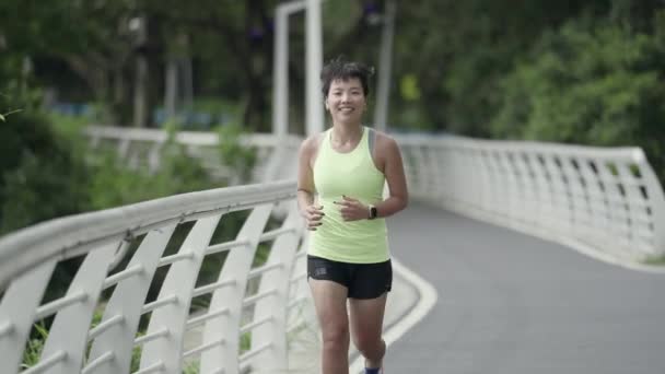 Young Asian Woman Jogging Running Outdoors Park — Stock Video