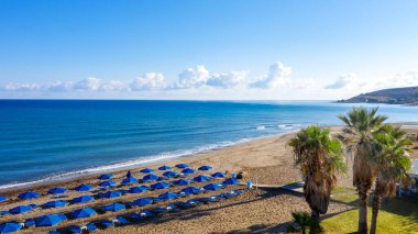 Amazing beach with umbrellas, Crete island, Greece.