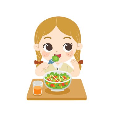 Çocuk lezzetli yemekler yiyor. Mutlu kız taze salata ve portakal suyu yemekten zevk alır..