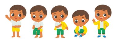 Küçük tatlı çocuk sabah rutininde mutlu bir gülümsemeyle adım adım giyiniyor. Çocuk adım adım giyinmeyi öğreniyor, bağımsızlığı ve kendine bakabilmeyi teşvik ediyor..