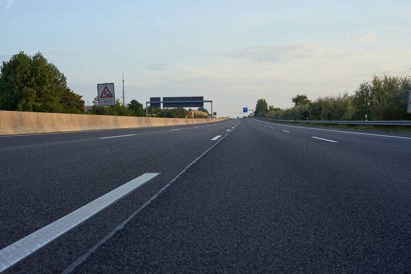 empty shabby 8-lane motorway during bridge works
