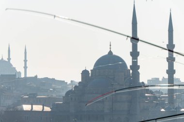 View from Galata Bridge, towards the New Mosque in Istanbul, Turkey