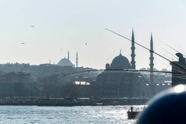 View from Galata Bridge, towards the New Mosque in Istanbul, Turkey