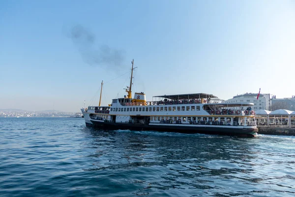 Close View of Boat Trip Vessel full of Tourists in Istanbul, Turkey