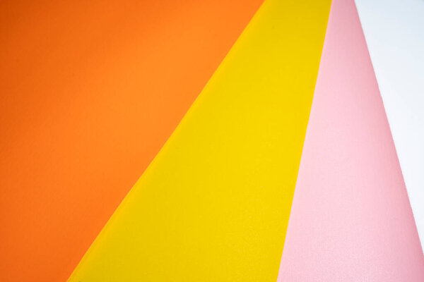 Оранжевый, желтый и розовый цвет пастельной бумаги для фона