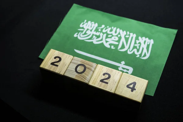2024, Saudi Arabia, Saudi Arabia flag with date block, Concept, Important events for Saudi Arabia in the new year, election, economy, social activities, central bank, Saudi foreign policy
