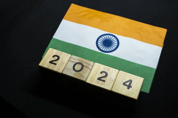 2024, India, India flag with date block, Concept, Important events for India in the new year, election, economy, social activities, central bank, India foreign policy