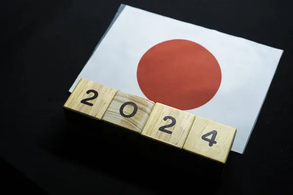 2024, Japan, Japan flag with date block, Concept, Important events for Japan in the new year, election, economy, social activities, central bank, Japan foreign policy