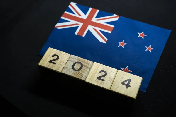 2024, New Zealand, New Zealand flag with date block, Concept, Important events for New Zealand in the new year, election, economy, social activities, central bank, New Zealand foreign policy