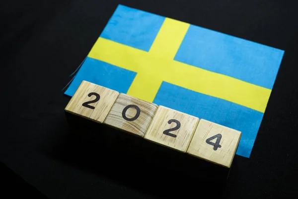 2024, Sweden, Sweden flag with date block, Concept, Important events for Sweden in the new year, election, economy, social activities, central bank, Sweden foreign policy