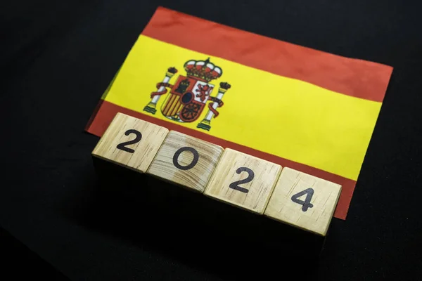 2024, Spain, Spain flag with date block, Concept, Important events for Spain in the new year, election, economy, social activities, central bank, Spain foreign policy