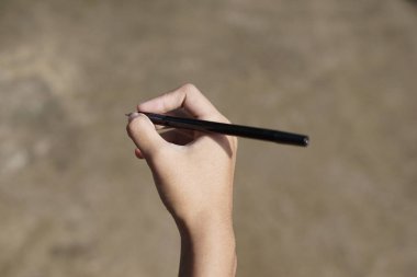 Bir kalem tutarak eğitim kavramı