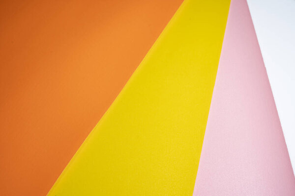 Оранжевый, желтый и розовый цвет пастельной бумаги для фона