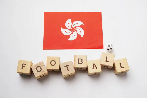 Hong Kong bayrağı, futbol unvanı ve beyaz arkaplan. futbol konsepti
