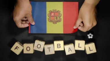Futbol unvanlı Andorra bayrağı. futbol konsepti